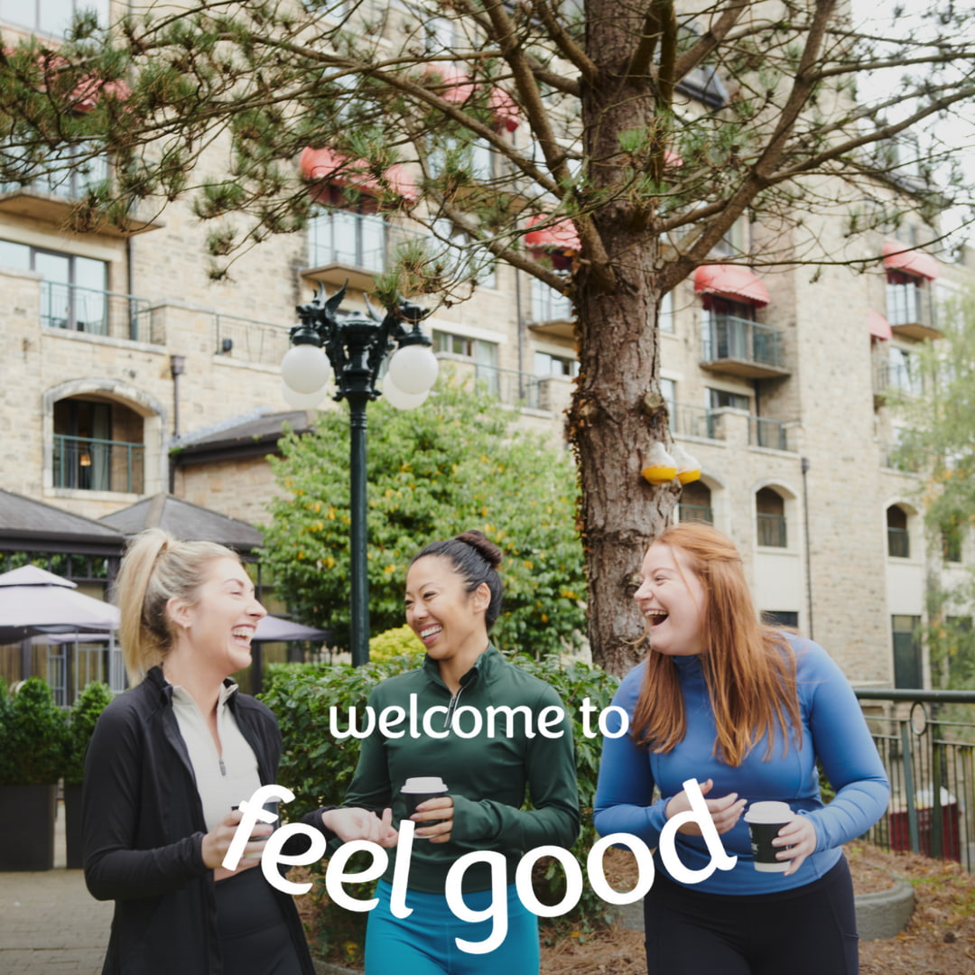 group of girls laughing over coffee
