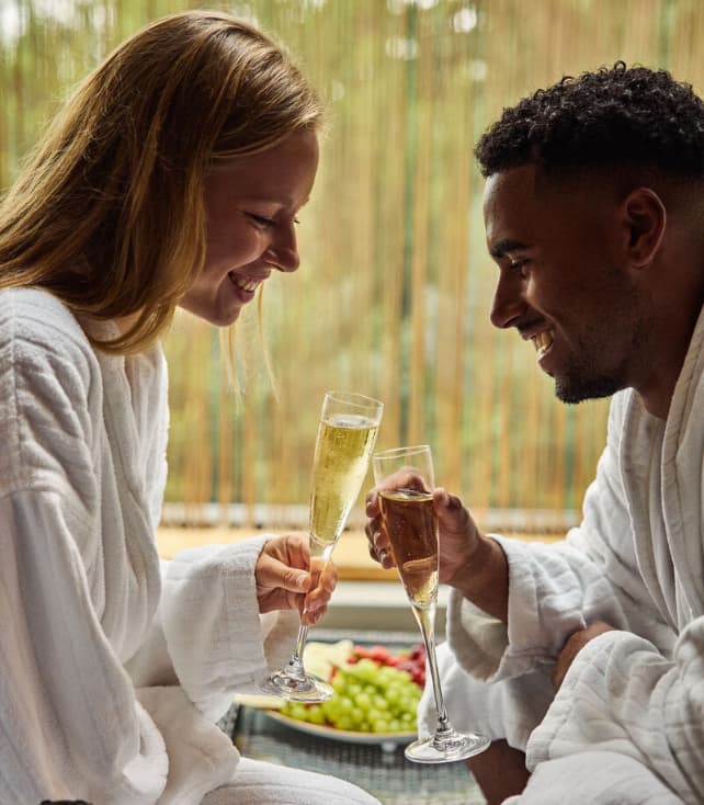 Couple Enjoying Pool and Spa Facilities