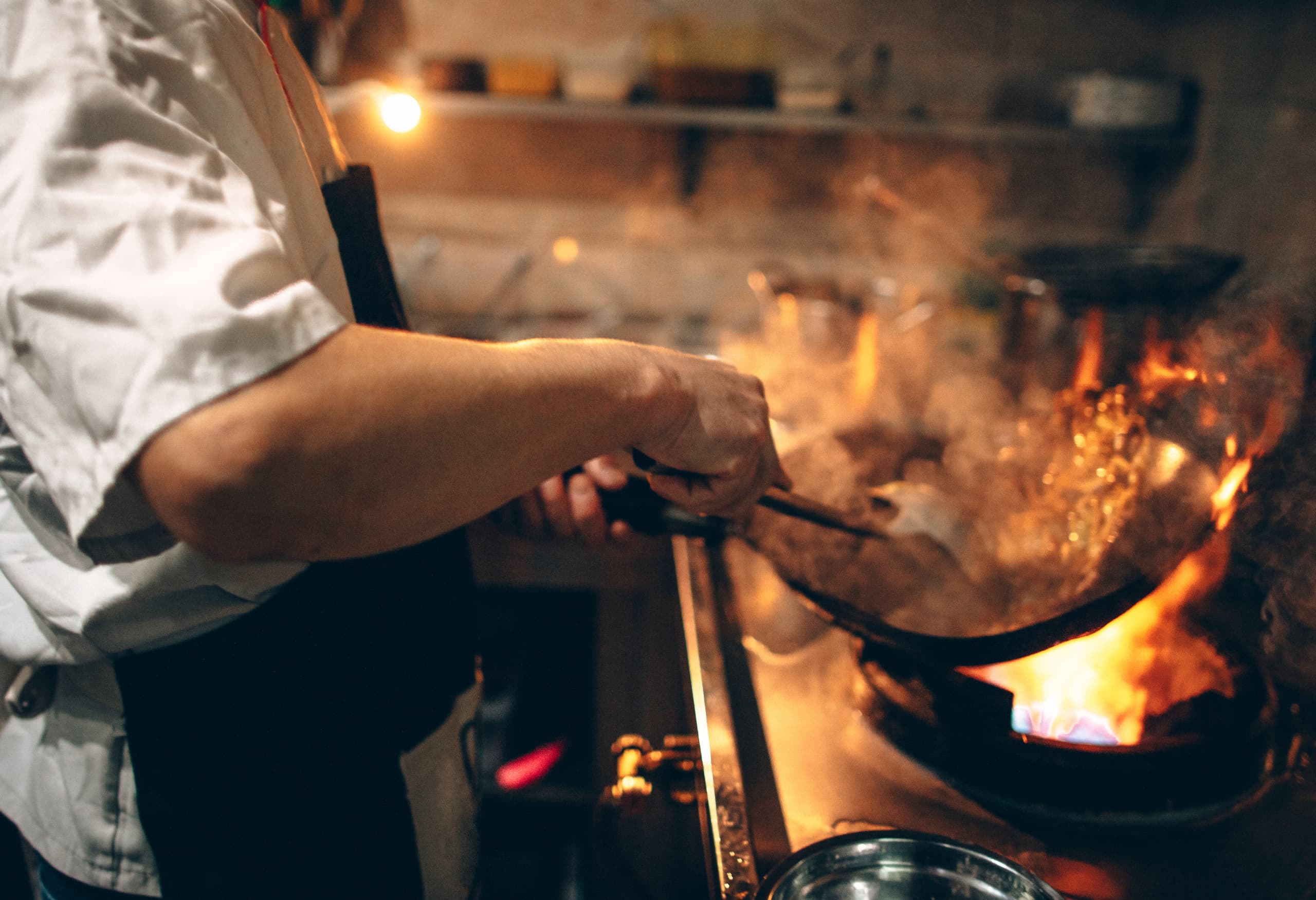 Chef Cooking in Kitchen
